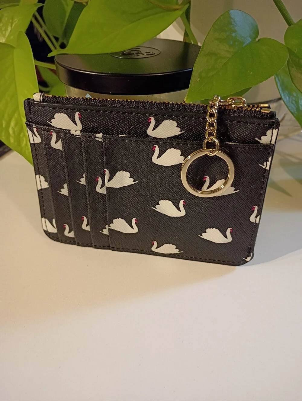 kate spade black white swan card pouch with gold-tone accents